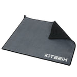 Triathlon transition mat with microfiber suede top and black natural rubber base.